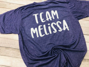 Melissa Scoggins Franks Benefit soft purple tee